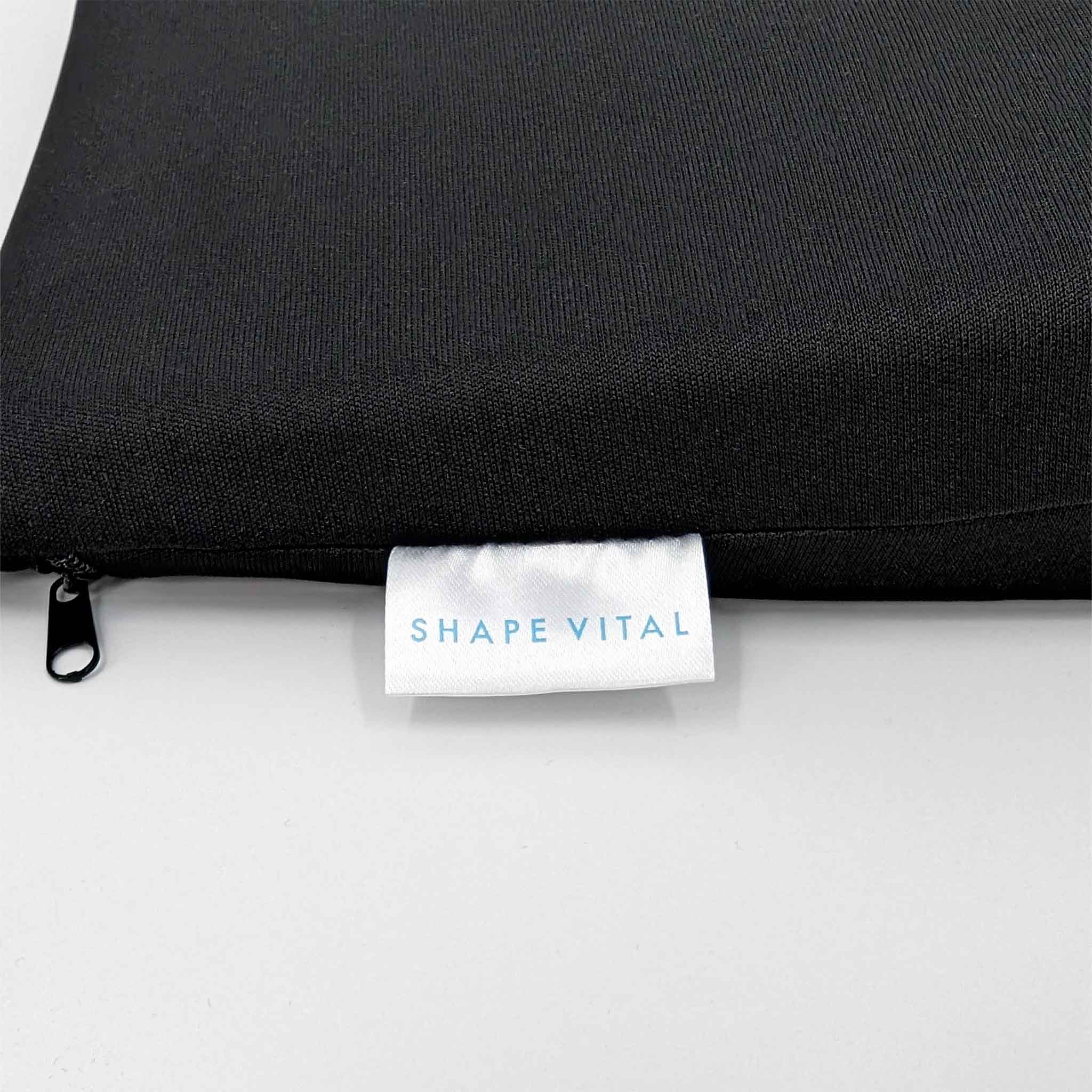 Coussin d’assise ergonomique en forme de coin