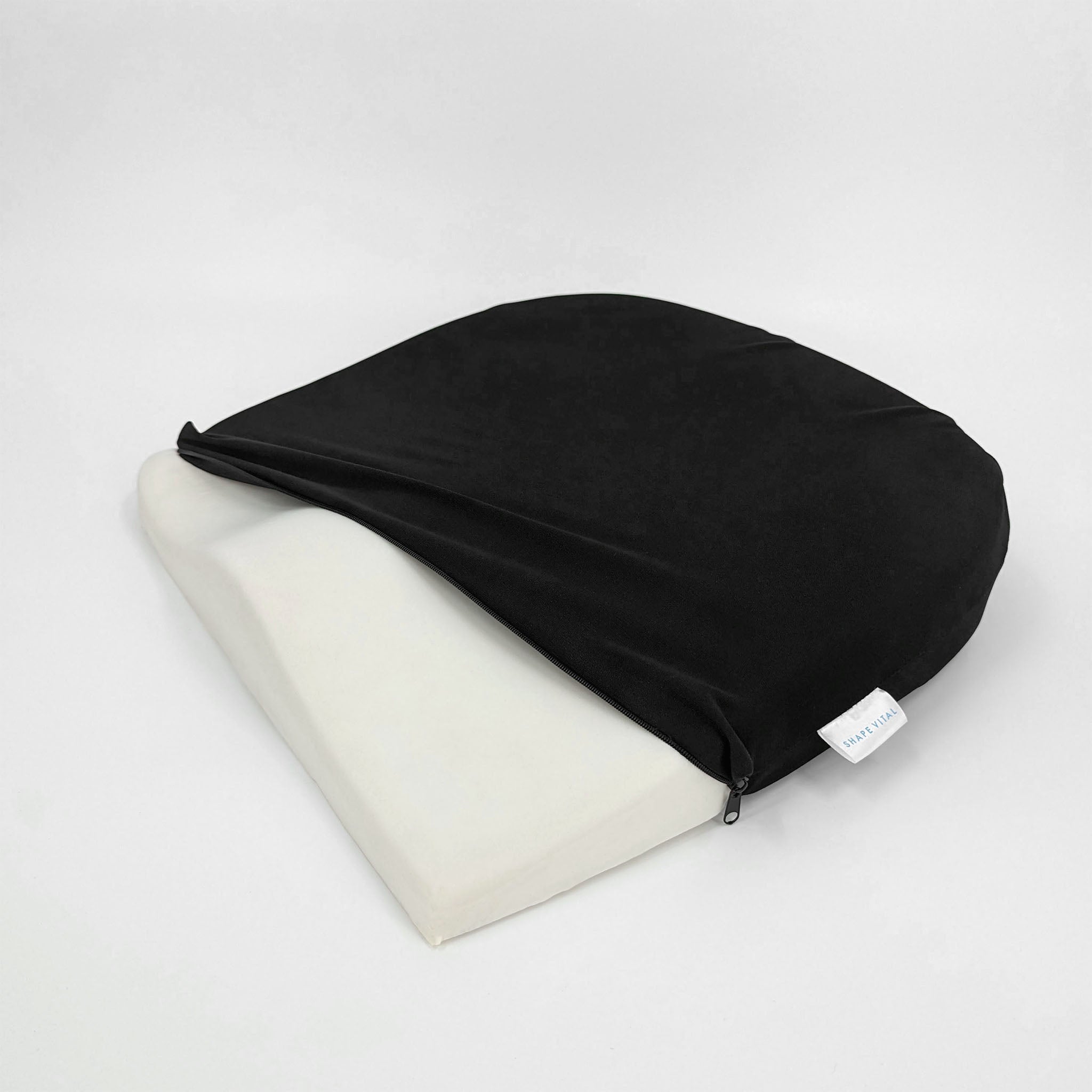 Coussin d’assise ergonomique en forme de coin